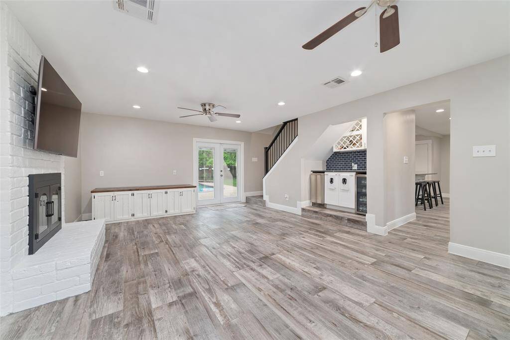 Contemporary tile seamlessly flows throughout
