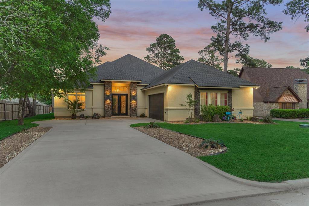Welcome to this stunning custom home located in the highly sought-after community of Walden on Lake Conroe.