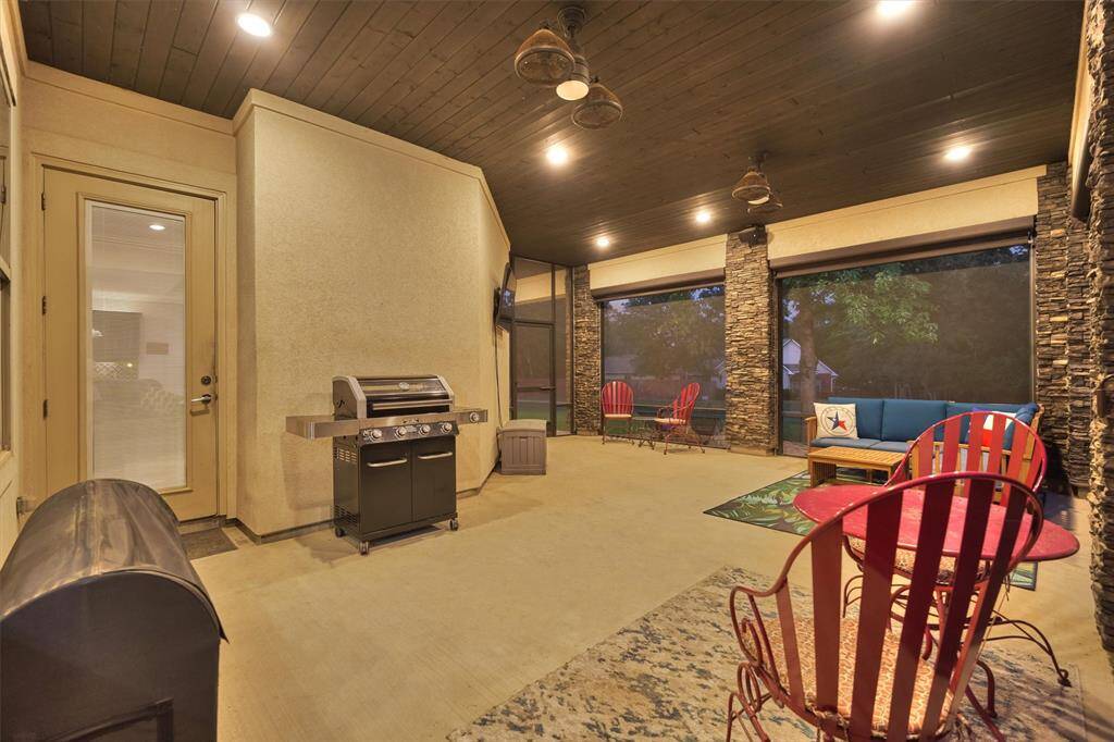 A stunning screened-in porch just off the living room makes it easy to extend your entertaining outdoors! Thoughtfully designed for convenience, it also features direct access to the back porch, creating a seamless flow between indoor and outdoor living spaces.