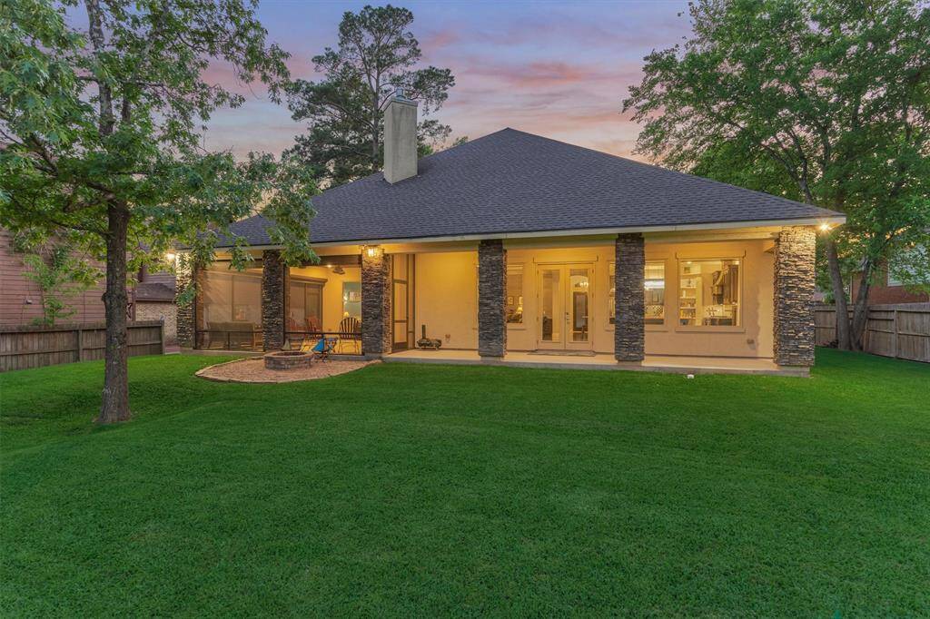 Enjoy the extended back porch area, thoughtfully designed with both open and screened-in sections—perfect for relaxing in the shade, entertaining guests, or simply taking in the serene views year-round.