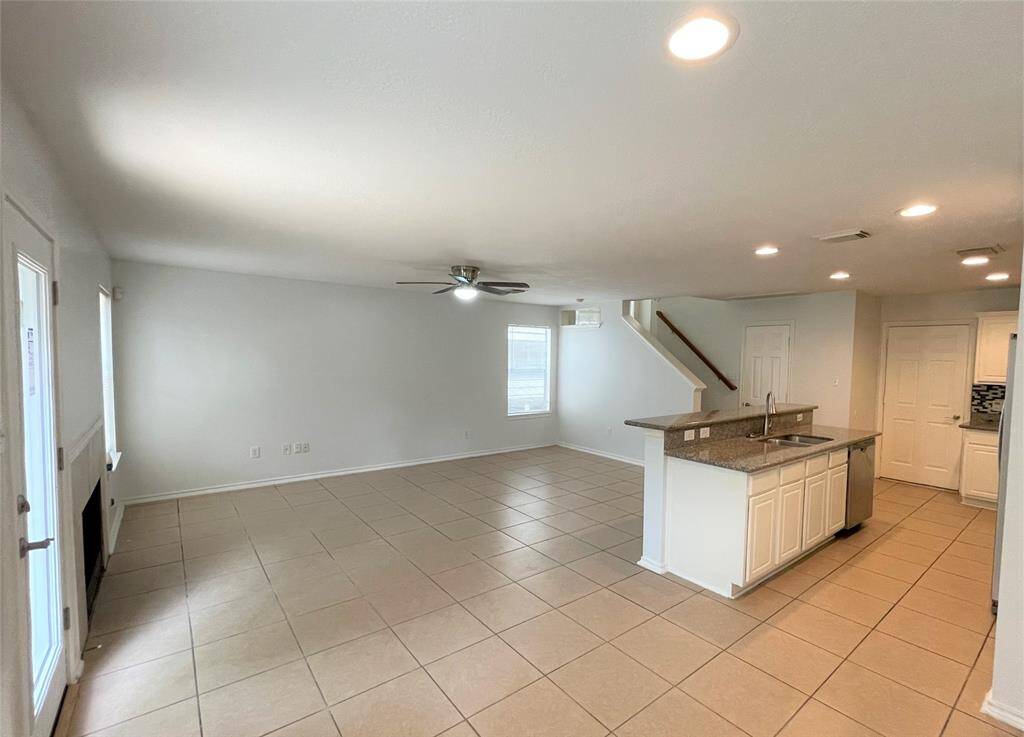 another view of kitchen, breakfast and living room