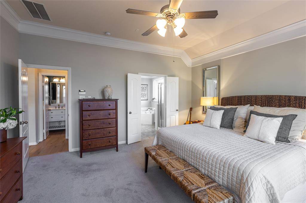 Primary bedroom with view of ensuite