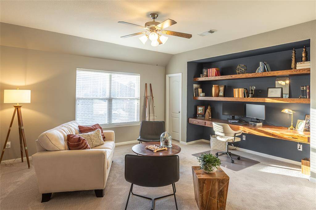 Note natural light, secondary work station (if you need 2) on custom shelving