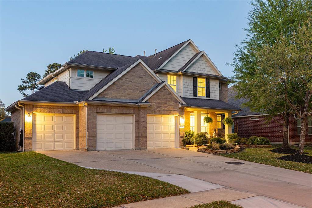 Driveway extended, coach lights and charming porch