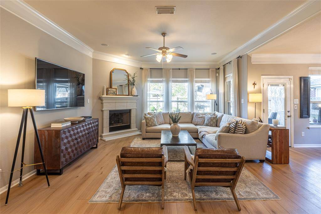 Handsome LVP flooring and cast stone fireplace with gas logs are sought after features you will find in this home
