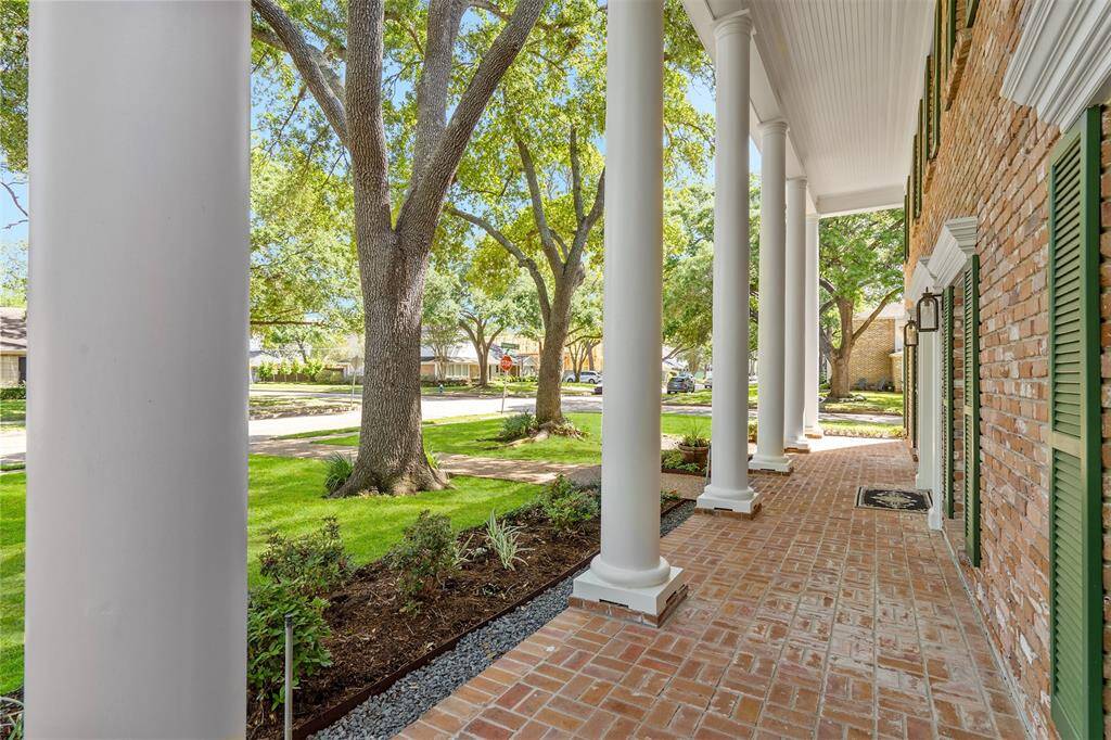 Charming front porch to enjoy the neighborhood.
