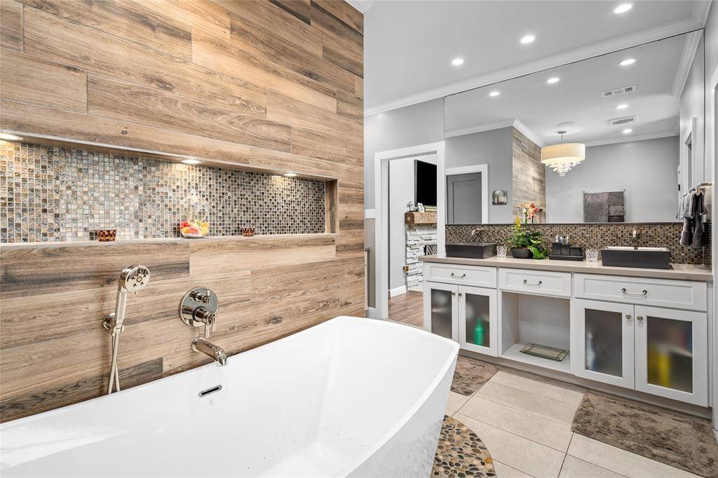 Wood-like accent wall with glass tile inset.