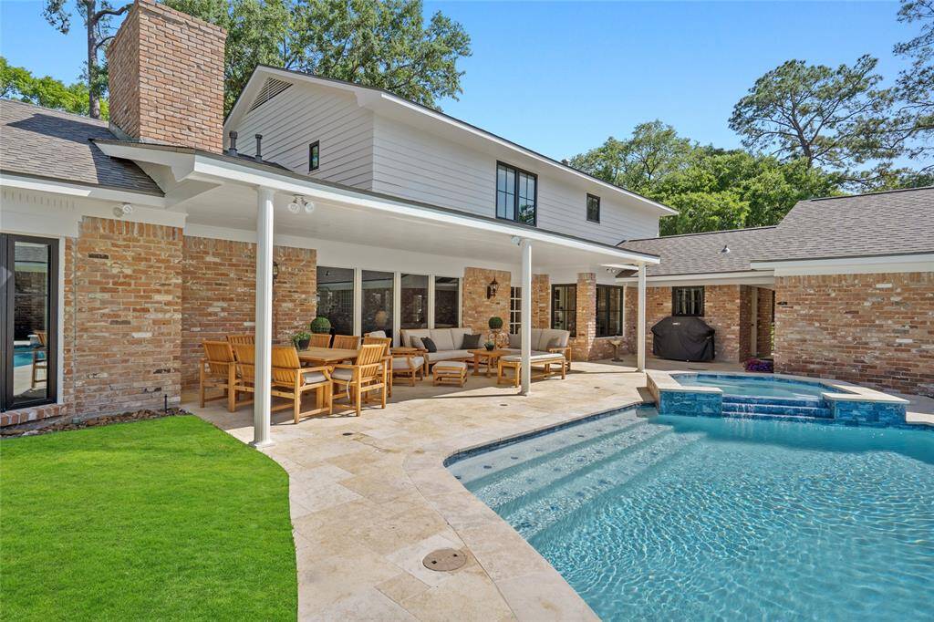 Wonder covered patio extends the home's entertaining space.