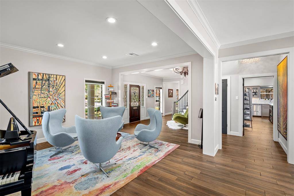 A view from the family room towards the living room and entry.