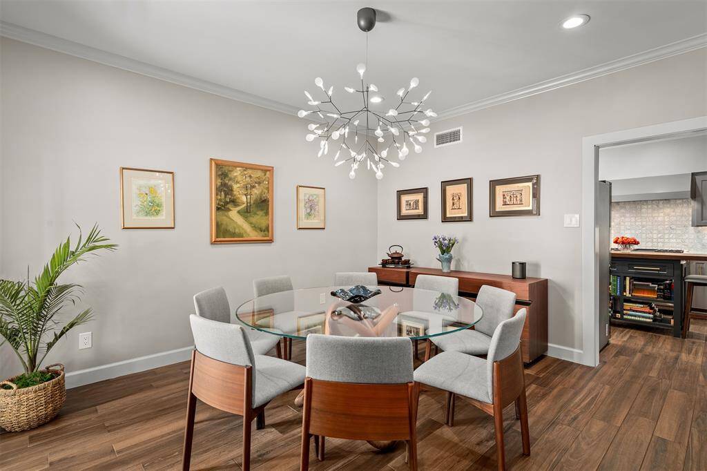 Kitchen is conveniently located through the cased opening.