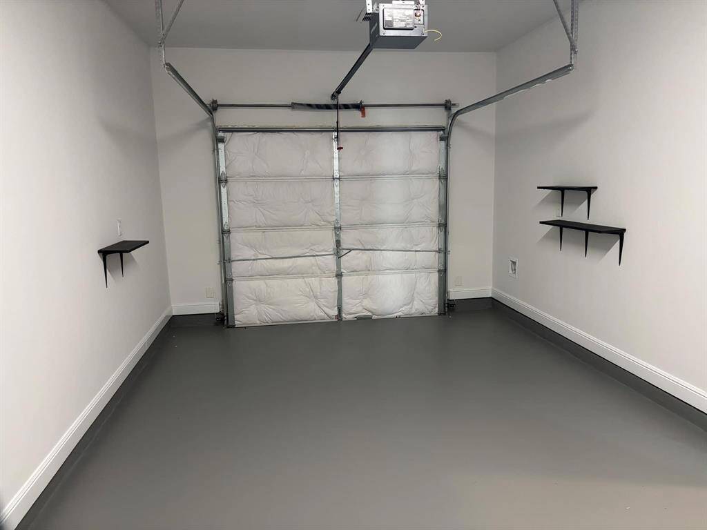 The Private One Car Garage has been totally repainted from Ceiling to Garage Floor