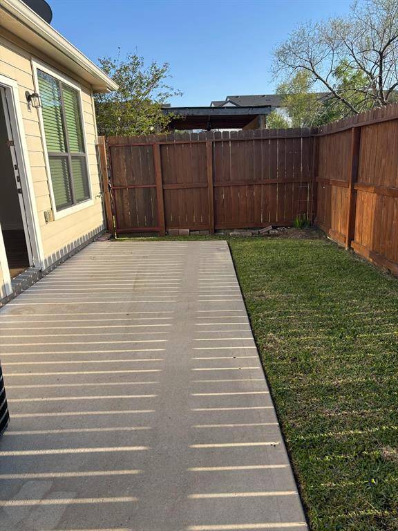2nd View of Patio/Backyard (/fence pressure washed and restained)