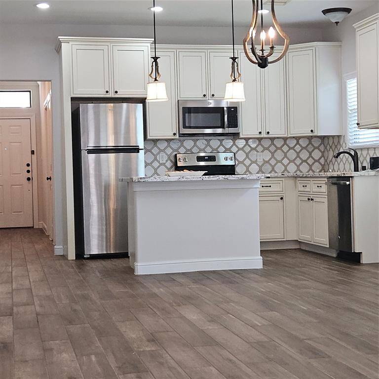 Granite Counter Tops, Island, Beautiful Soft Close Cabinetry