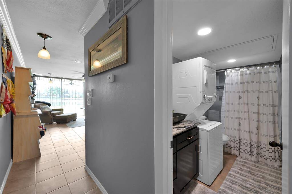 The bathroom is conveniently located between the living area and bedroom for easy access.