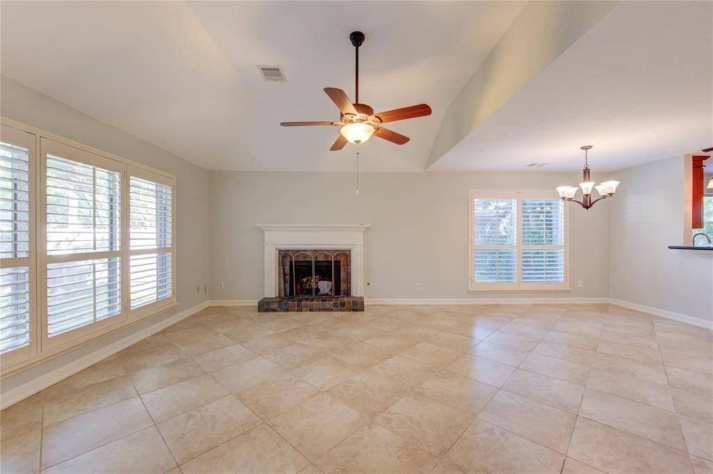 family room overlooking backyard and open to dining area.