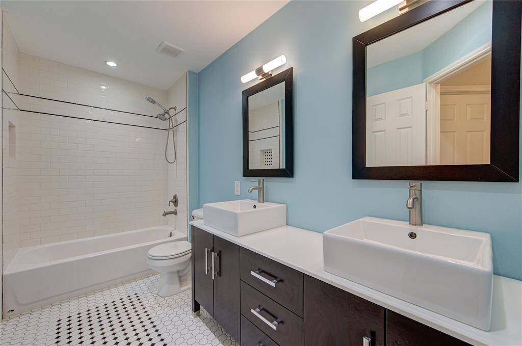 Full bath with tub and shower.