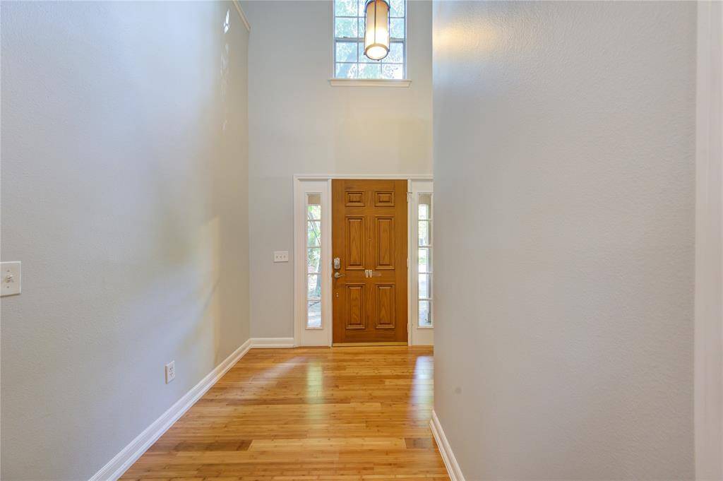 Welcome home as you enter the lovely 2 story entry with wood flooring. Tile floors are found throughout the rest of the 1st floor.