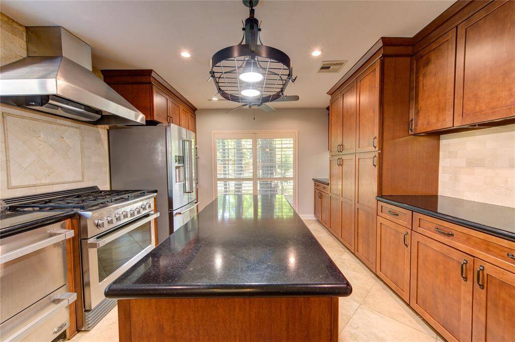 Wonderful island with extra cabinet space and outlets