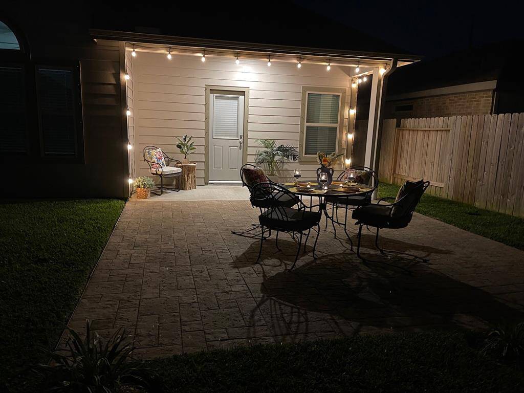 Enjoy romantic evening dinners on this great stone-paved extended patio.