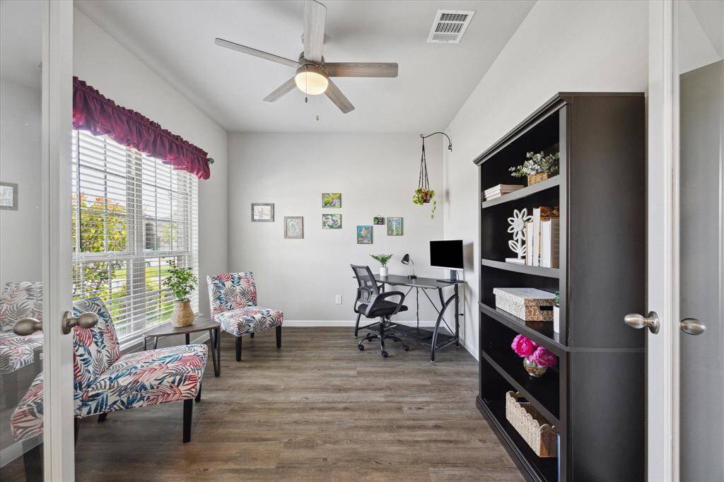 Charming French doors open to a great Home Office!