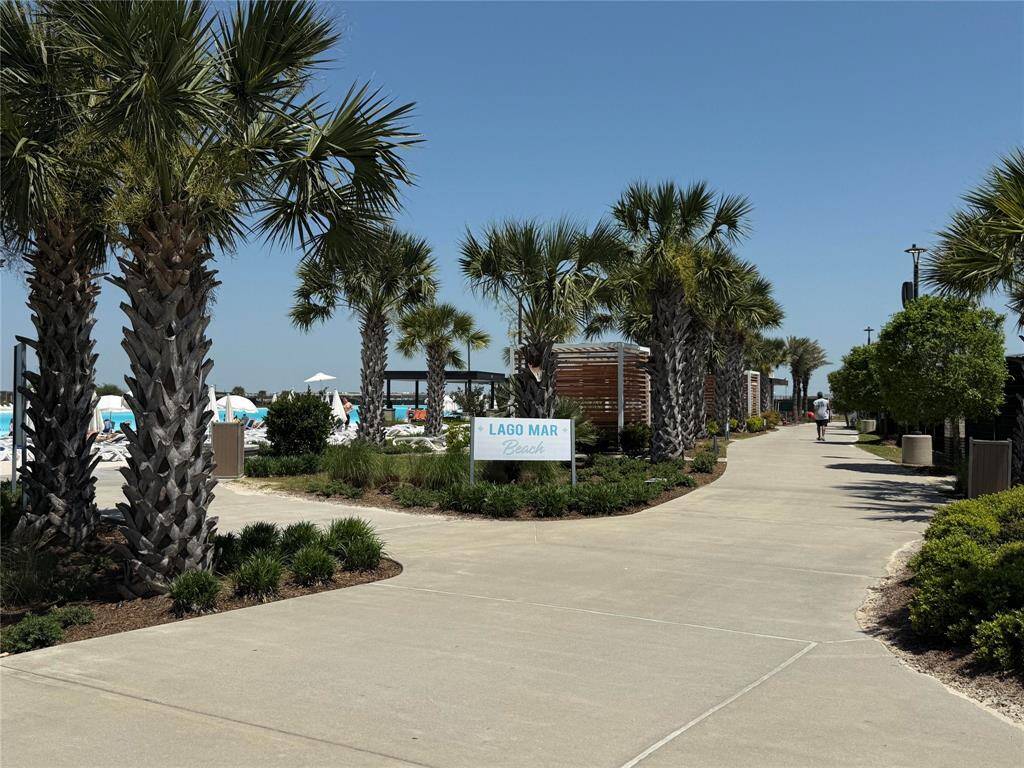 Time for a day in the sun - take a stroll down to the Lago Mar White Sand Beach!