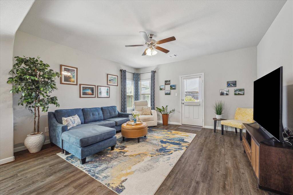 Comfy and Spacious Family Room with great view of back yard. Ready for movie night?