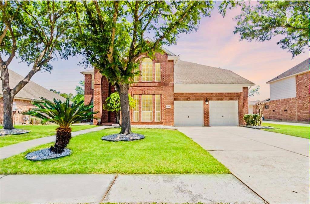 So sensational in Summerwood! This gorgeous Meritage Builders 4/3.5/2 home is waiting for you! The two-story brick home features a spacious two-car garage, well-maintained lawn, and mature trees. The elegant facade and tidy landscaping will welcome you home each day in this fabulous Master-planned community and neighborhood! Enhanced photo.