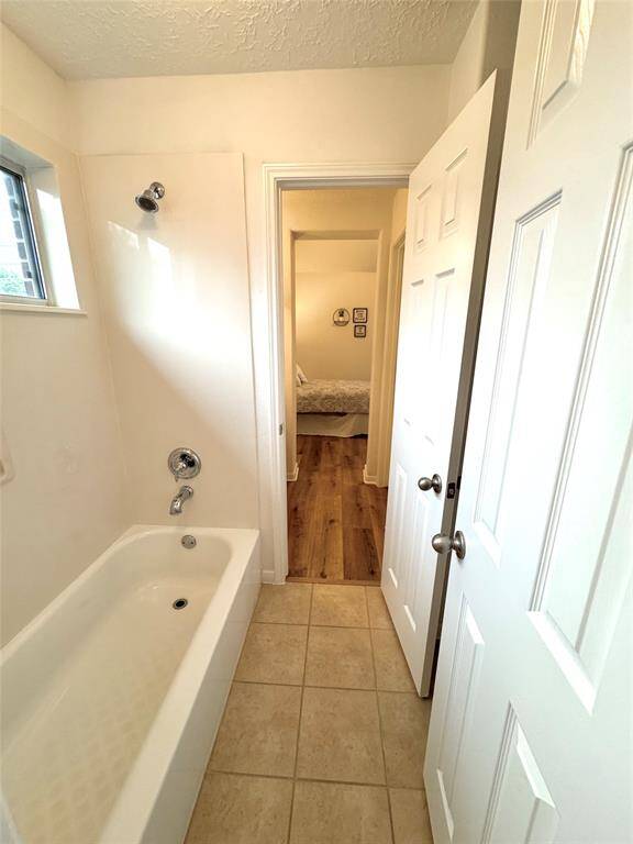 This is the shared tub/toilet space!