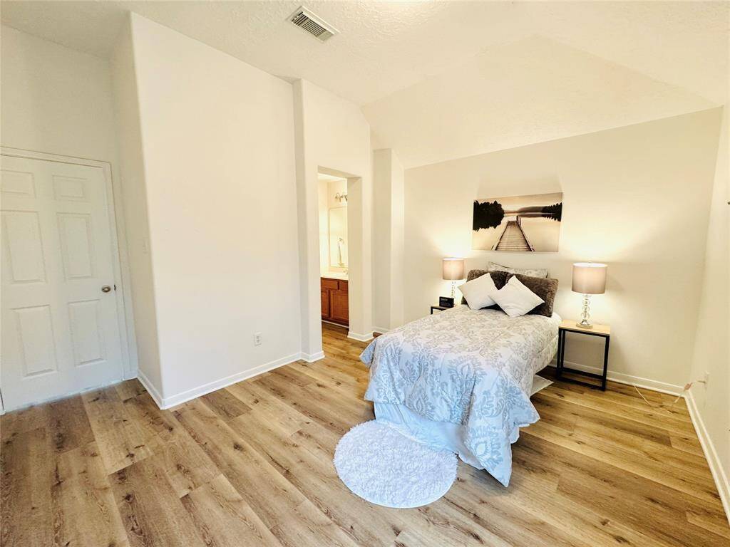 A view of Bedroom #3 with the entrance to the left.