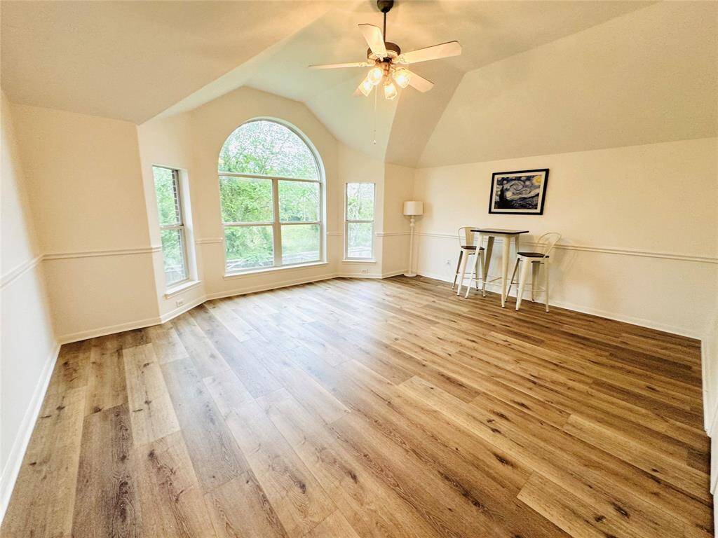The Game Room is off of the back of the home and has a love bay window with arch! These are double pane Low E windows! The room also has This room has updated LVP wood flooring (2024), and updated wall and trim paint (2024)!