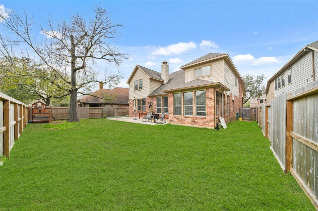 Welcome to your new backyard! Check out all of that wonderful green space for the kids and pets to run around in, and a fantastic patio perfect for entertaining family, friends, and guests.