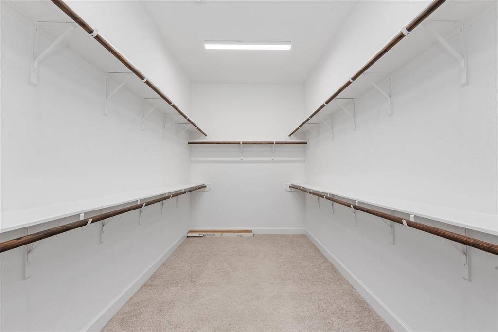 Enormous walk-in Primary closet!