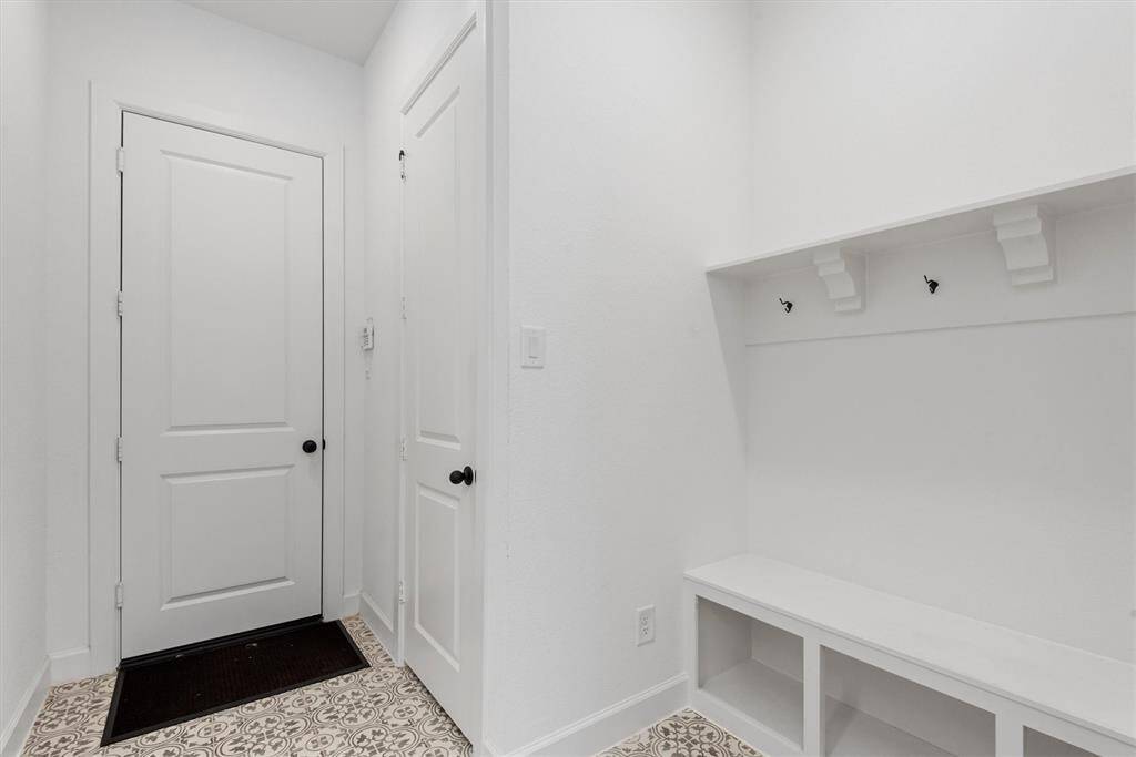 Mud room next to garage