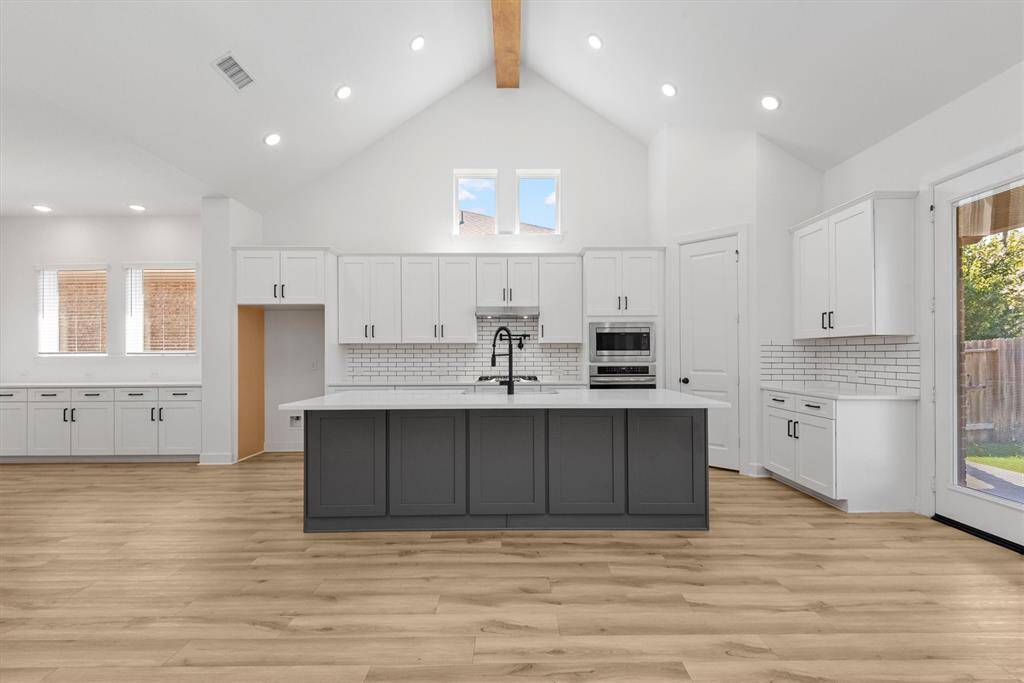 Transom windows allow for additional natural light