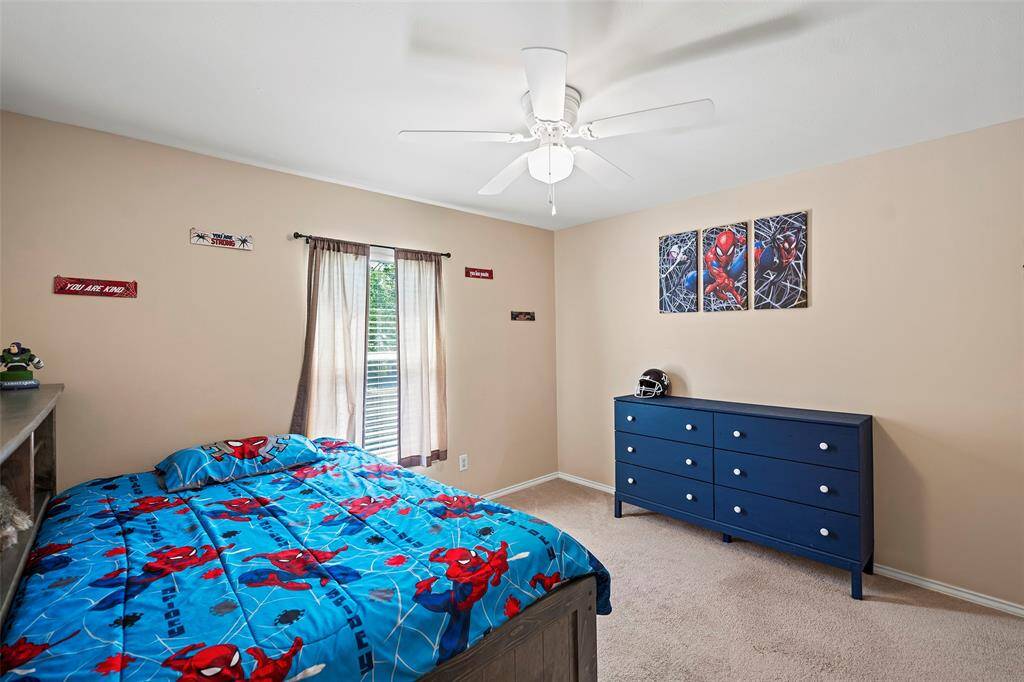 Another secondary bedroom, light and bright with views of the trees!