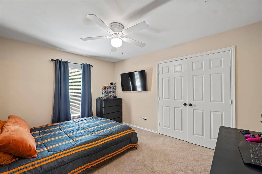 And lastly, this secondary with a double door closet has lots of room for all your storage needs!