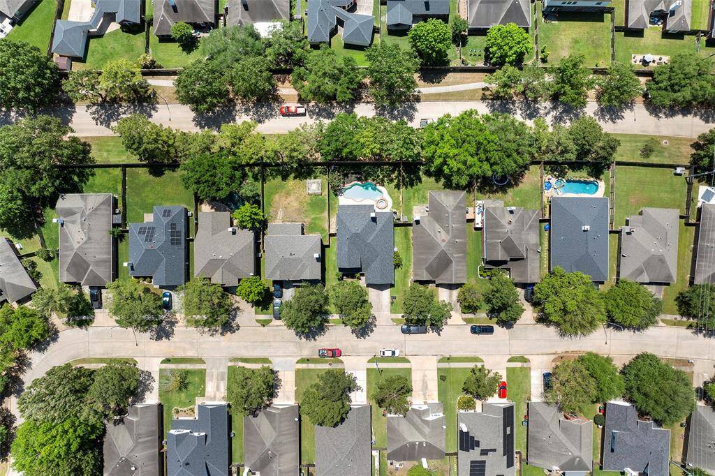 This view shows that you have NO REAR NEIGHBORS, and tons of mature trees for added privacy!