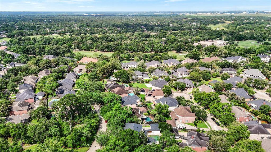 Aerial view of the community and neighboring homes.