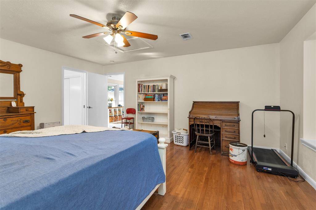 Primary bedroom is off the living room and separate from the upstairs secondary bedrooms