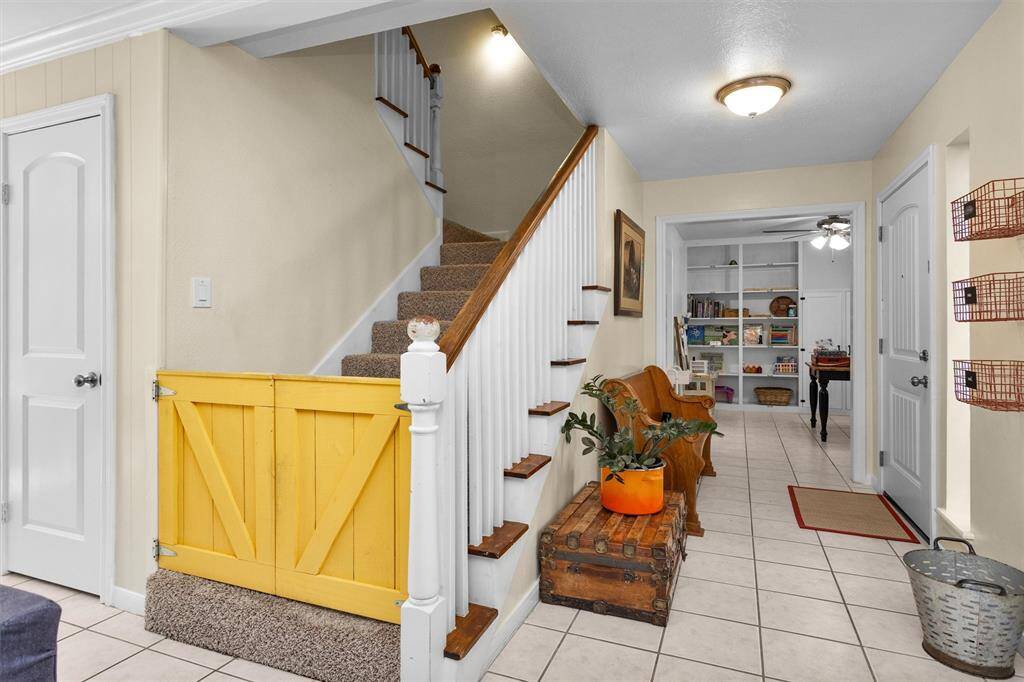 Stairs to secondary bedrooms and bathroom