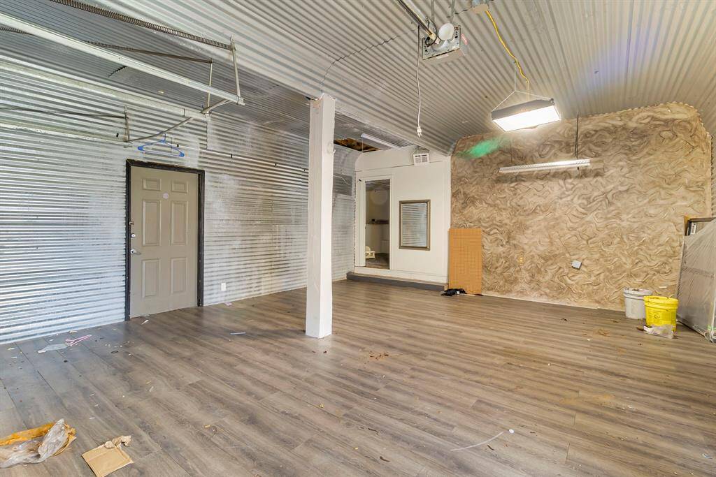 enclosed garage area features heat and air!