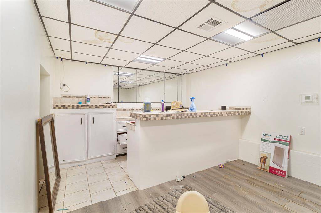 converted garage space also features a 1/2 bath and built ins!