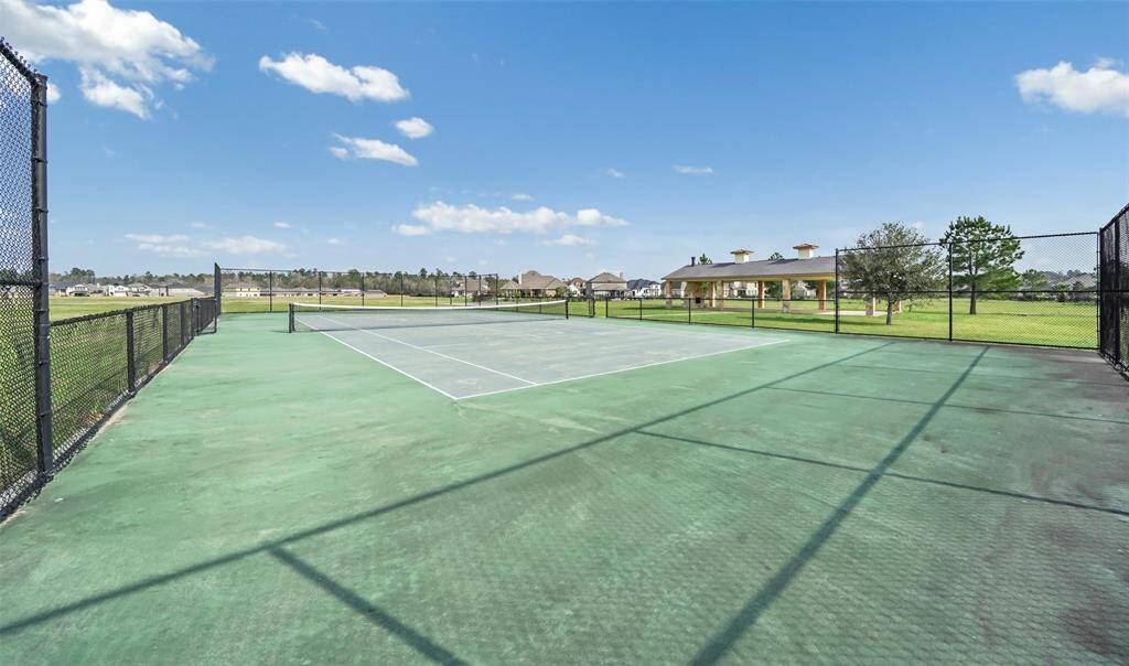 Enjoy playing tennis with family and friends.