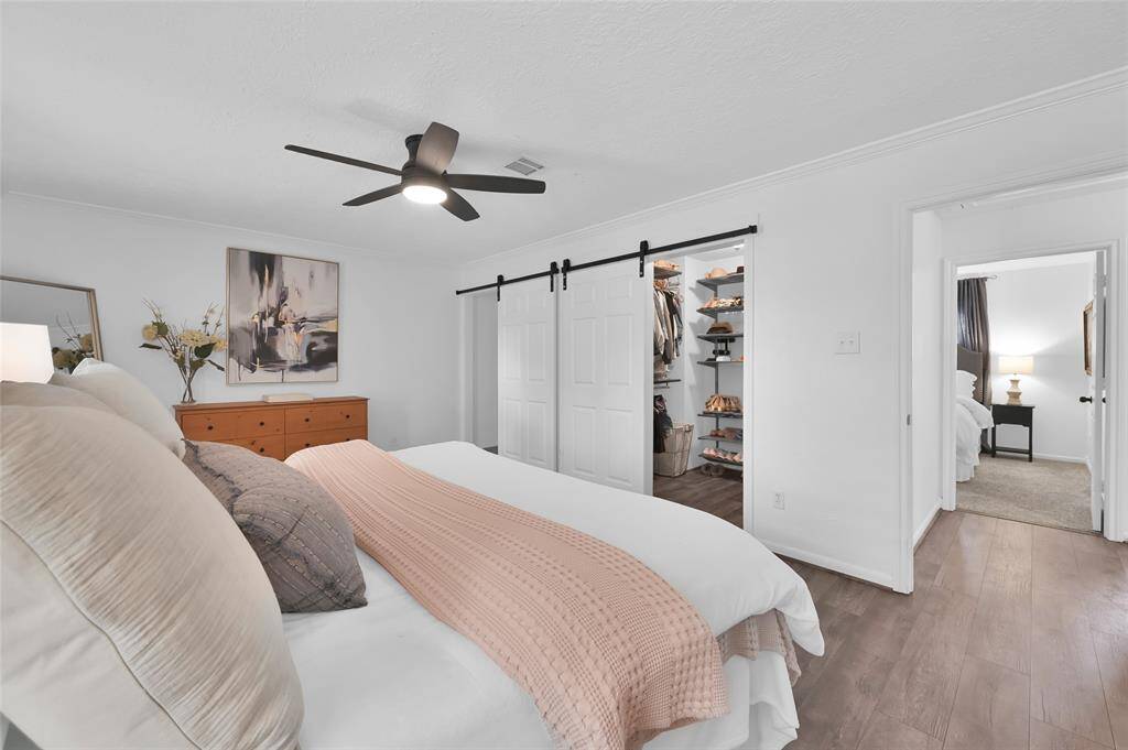 This room also has a ceiling fan with light and is controlled by a remote.