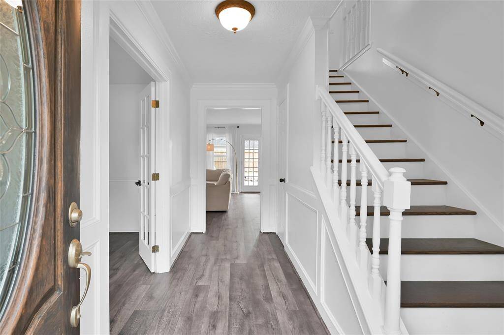 Greet guests in the Foyer as you open the wood and glass front door to welcome them into your home. Follow the Foyer through to the Living Room or head up the wood tread stairs to the bedrooms upstairs. You can also enjoy leaving the front door open for visibility with the added storm door.