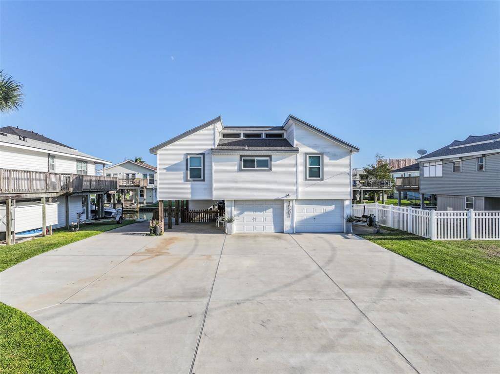 Home features additional space for extra parking or play areas, effectively quadrupling their utility. Two car attached garage with workshop inside.