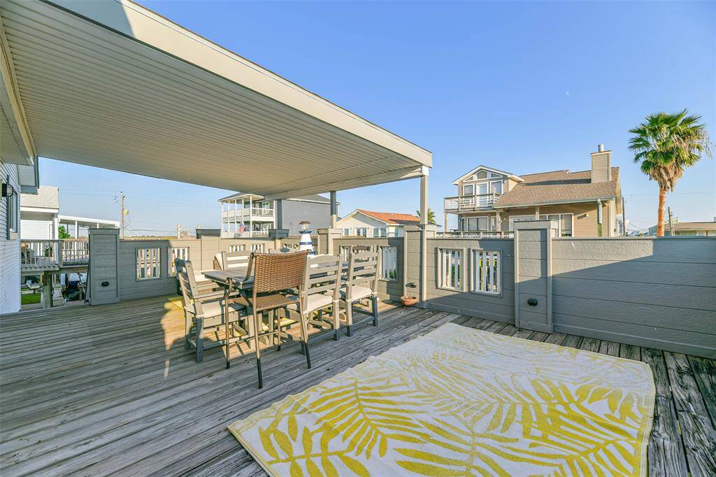 Spacious oversized patio decking located on the upper level.