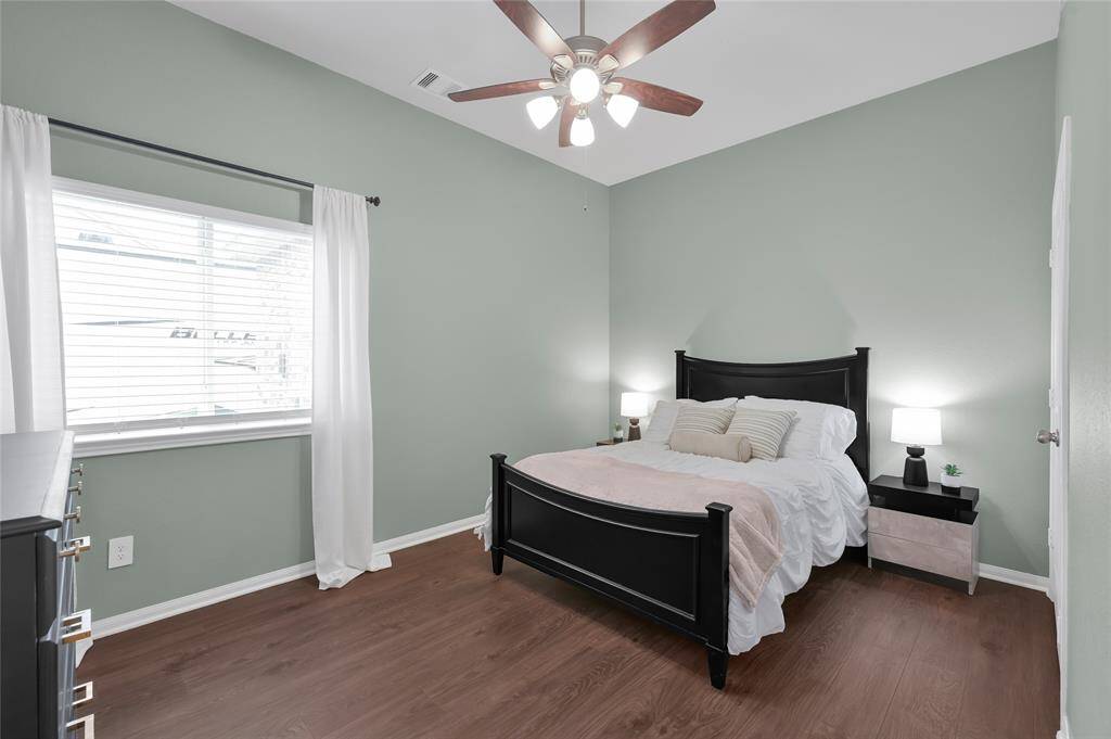 Cozy 3rd secondary bedroom with ample natural light.