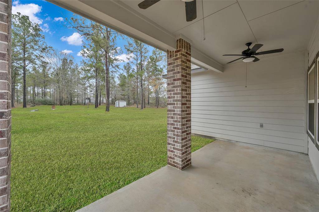 Relax and take in beautiful Texas sunsets on your covered patio with TWO CEILING FANS. This space is perfect for outdoor dining and enjoying nature.