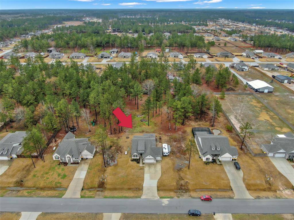 This home is truly tucked away in the tranquil woods with plenty of space between you and your neighbors with a lot almost 125 feet wide and a length of 351 feet.